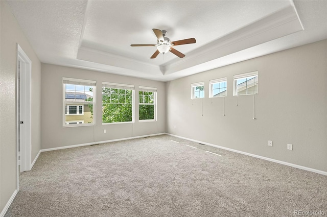 19659 W 59th Dr, Golden, CO 80403 - carpeted spare room featuring a raised ceiling and a ceiling fan