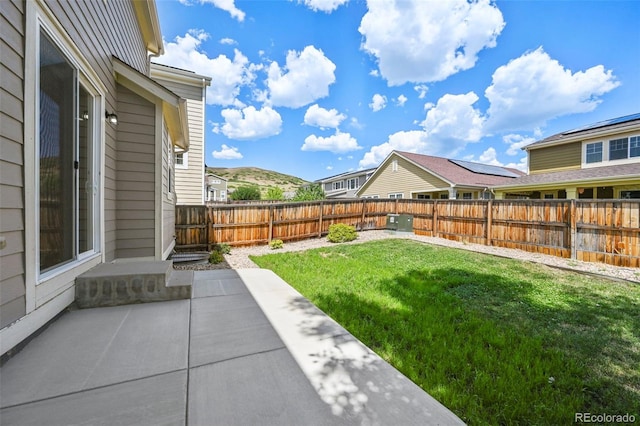 19659 W 59th Dr, Golden, CO 80403 - fenced backyard with a patio area