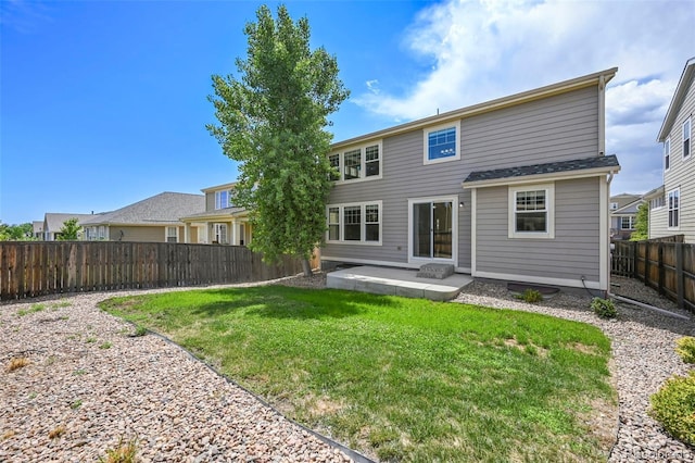 19659 W 59th Dr, Golden, CO 80403 - back of property with a patio and a fenced backyard