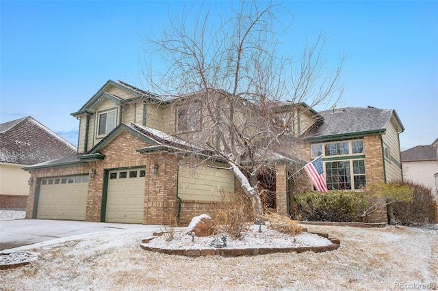 view of front of property featuring a garage