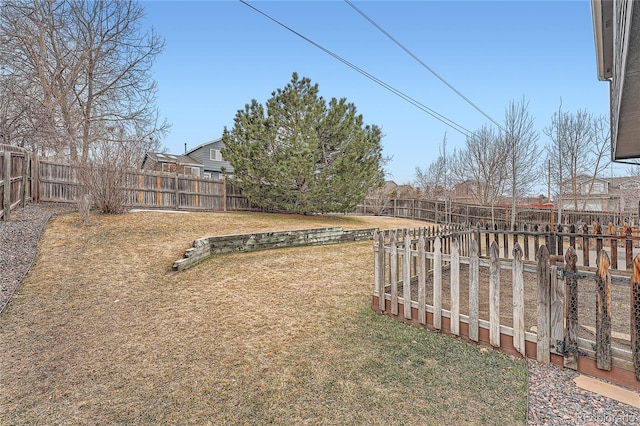 view of yard featuring a fenced backyard