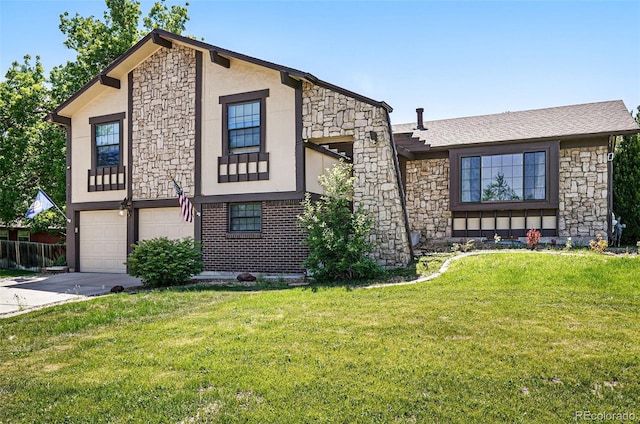 5197 S Perry St, Littleton, CO 80123 - view of front of home featuring stone siding, driveway, an attached garage, and stucco siding