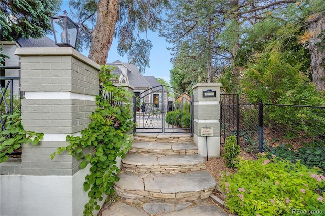 view of gate with fence