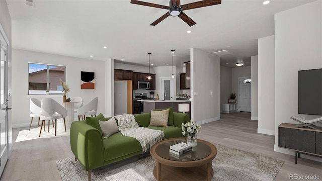 434 Clear Creek Dr, Grand Junction, CO 81504 - living area with light wood-style flooring, ceiling fan, and recessed lighting