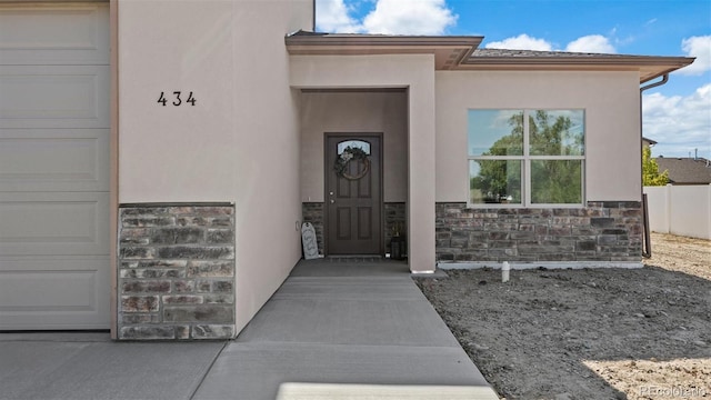 434 Clear Creek Dr, Grand Junction, CO 81504 - property entrance featuring stucco siding and stone siding