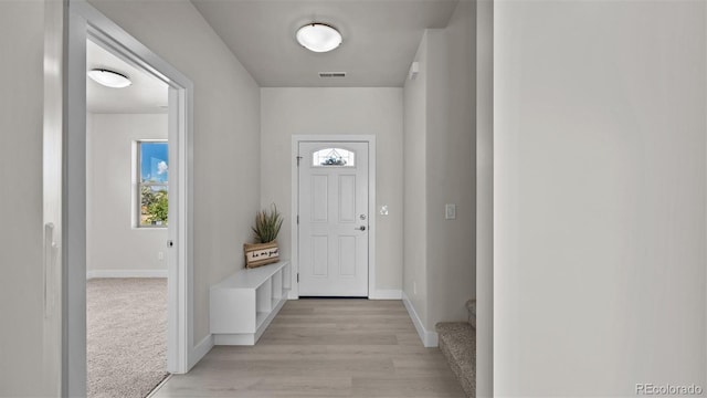 434 Clear Creek Dr, Grand Junction, CO 81504 - doorway with baseboards and light wood-style flooring