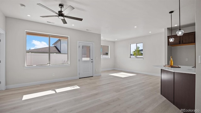 434 Clear Creek Dr, Grand Junction, CO 81504 - unfurnished living room with ceiling fan, light wood finished floors, and recessed lighting