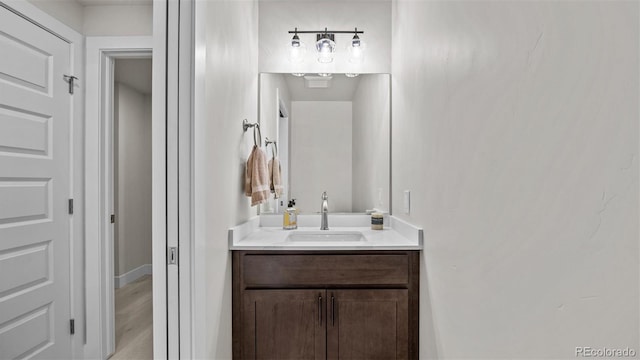434 Clear Creek Dr, Grand Junction, CO 81504 - bathroom featuring vanity and wood finished floors
