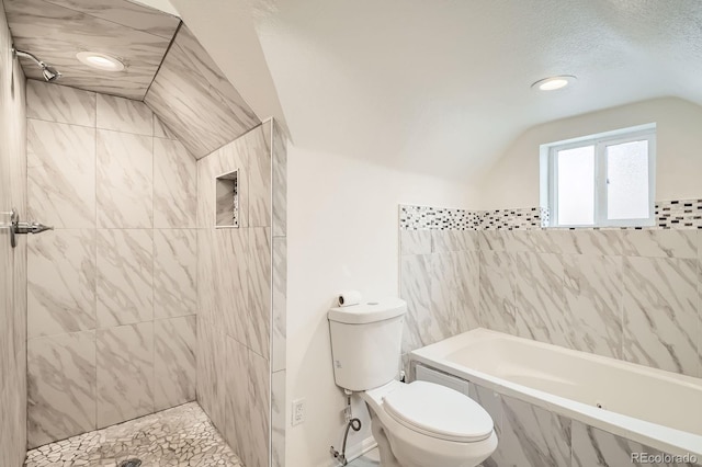 160 W Bayaud Ave, Denver, CO 80223 - bathroom with vaulted ceiling, a tub with marble appearance, toilet, a tile shower, and baseboards