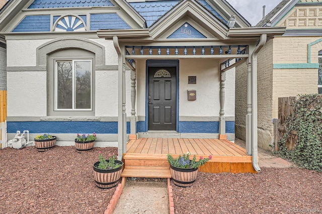 160 W Bayaud Ave, Denver, CO 80223 - property entrance with stucco siding