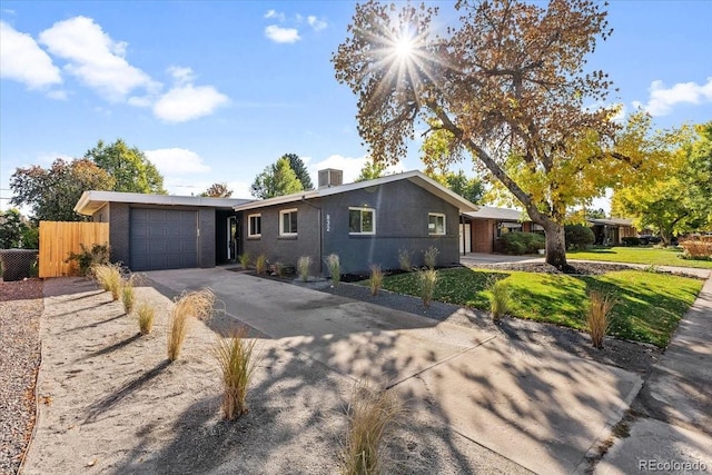 single story home featuring a garage