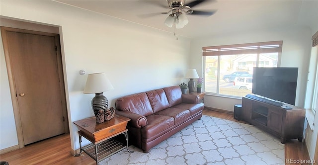 4901 Grove St, Denver, CO 80221 - living room with light wood-style floors and a ceiling fan