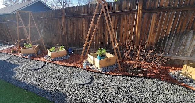 4901 Grove St, Denver, CO 80221 - view of yard featuring a vegetable garden