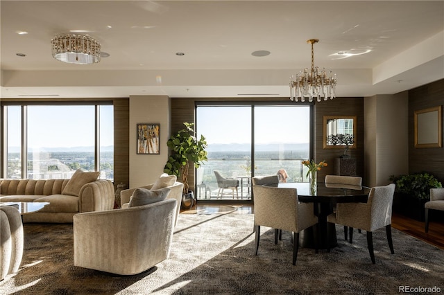 dining room with a notable chandelier and dark wood-type flooring