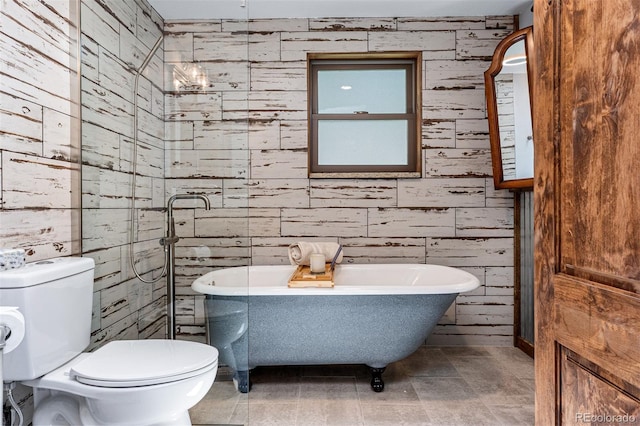 bathroom with toilet and a bathing tub