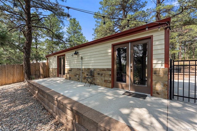 back of house featuring a patio area