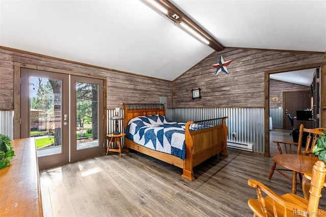 bedroom with hardwood / wood-style flooring, a baseboard radiator, vaulted ceiling with beams, and access to exterior