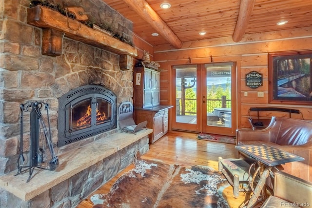 291 County Road 452, Grand Lake, CO 80447 - living area featuring wooden ceiling with exposed beams, light wood-type flooring, recessed lighting, a fireplace, and wooden walls