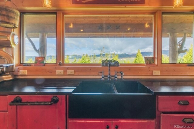 291 County Road 452, Grand Lake, CO 80447 - kitchen featuring plenty of natural light, dark countertops, and a sink
