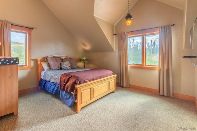 291 County Road 452, Grand Lake, CO 80447 - bedroom featuring vaulted ceiling, light colored carpet, and multiple windows