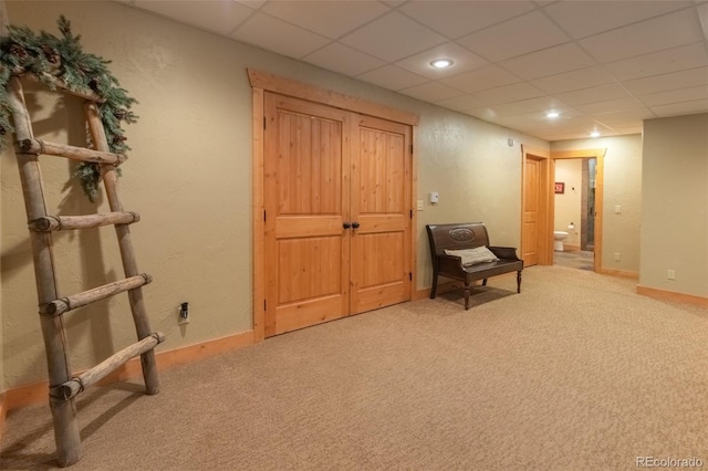 291 County Road 452, Grand Lake, CO 80447 - living area featuring carpet floors, a drop ceiling, recessed lighting, and baseboards