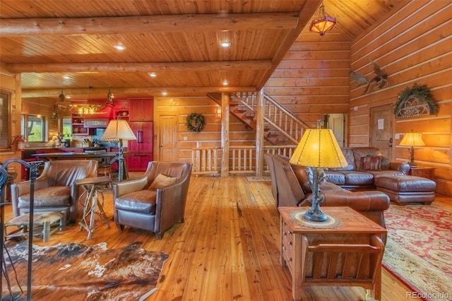 291 County Road 452, Grand Lake, CO 80447 - living area featuring wood ceiling with exposed beams, light wood-style floors, and stairway