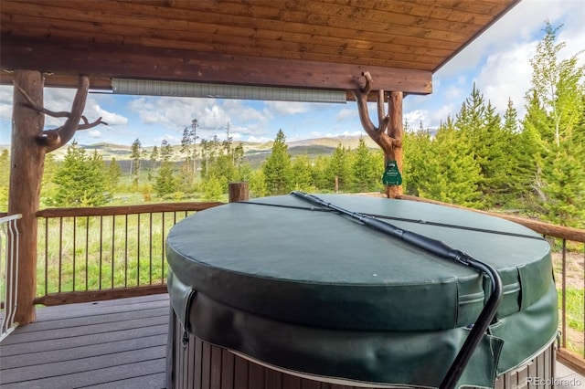 291 County Road 452, Grand Lake, CO 80447 - deck featuring a hot tub and a mountain view