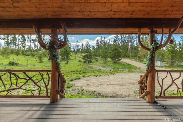 291 County Road 452, Grand Lake, CO 80447 - wooden deck with view of scattered trees