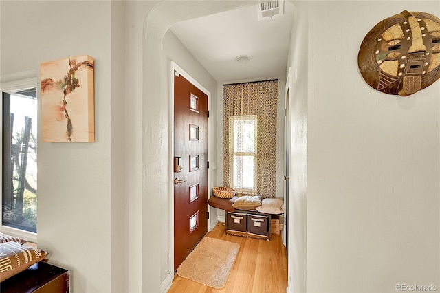 corridor with light wood finished floors