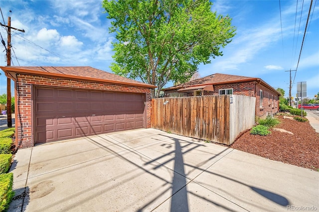 detached garage with fence