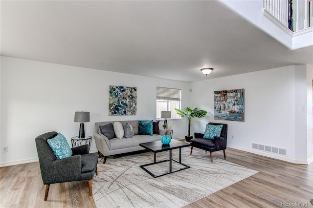 11183 E 114th Ave, Commerce City, CO 80640 - living area with light wood-style flooring and baseboards
