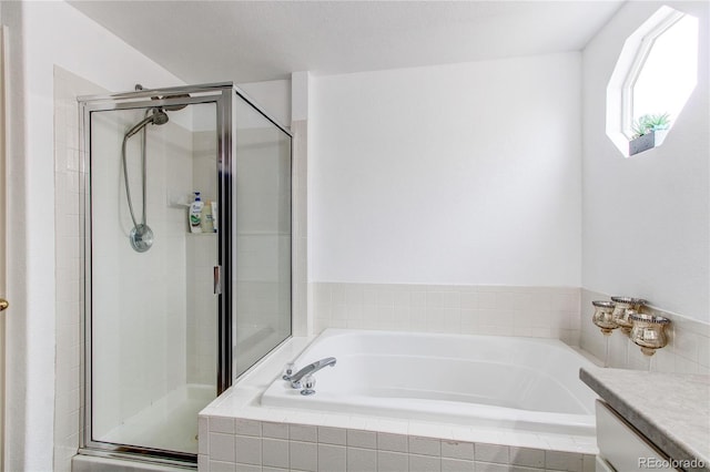 11183 E 114th Ave, Commerce City, CO 80640 - bathroom with a garden tub, a shower stall, and vanity