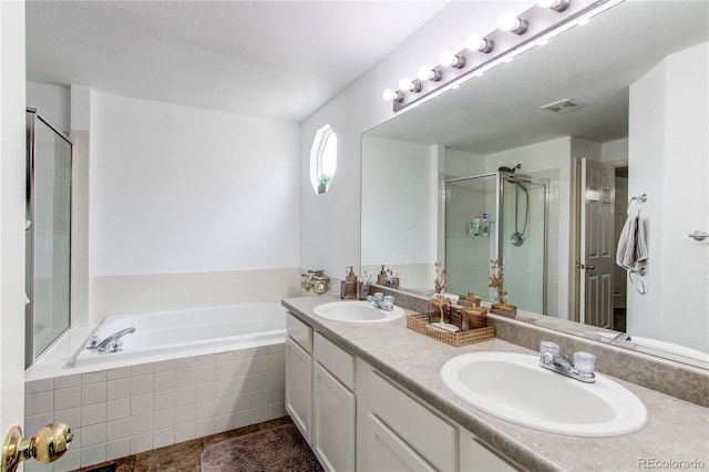 11183 E 114th Ave, Commerce City, CO 80640 - bathroom with a stall shower, double vanity, a bath, and tile patterned flooring