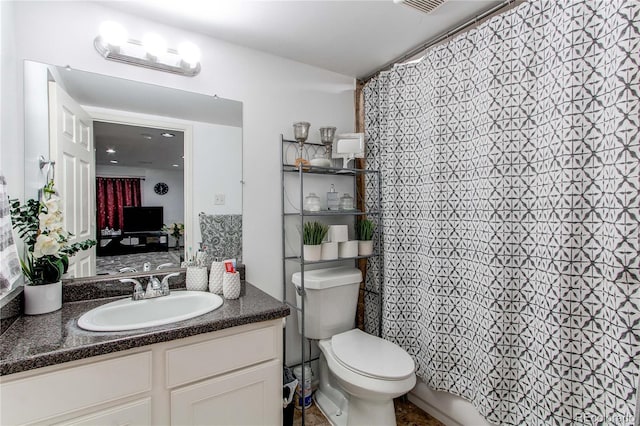 11183 E 114th Ave, Commerce City, CO 80640 - full bath featuring toilet, vanity, and curtained shower