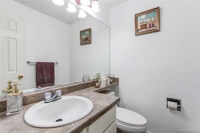 11183 E 114th Ave, Commerce City, CO 80640 - half bathroom with vanity and toilet