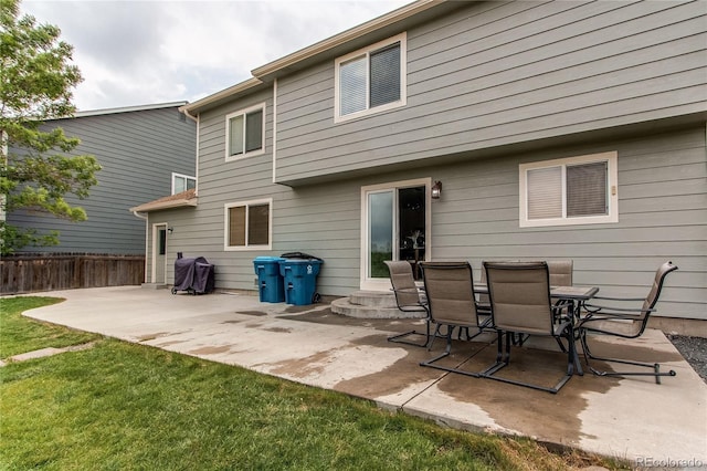 11183 E 114th Ave, Commerce City, CO 80640 - rear view of property with a patio