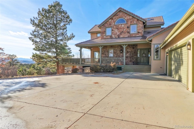 back of house with a porch