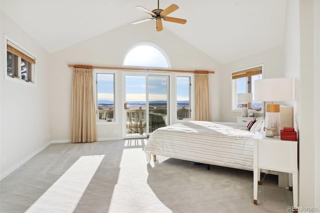 bedroom with light carpet, access to outside, high vaulted ceiling, and ceiling fan