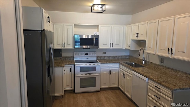 775 S Alton Way Unit 3D, Denver, CO 80247 - kitchen featuring appliances with stainless steel finishes, white cabinets, and dark wood finished floors