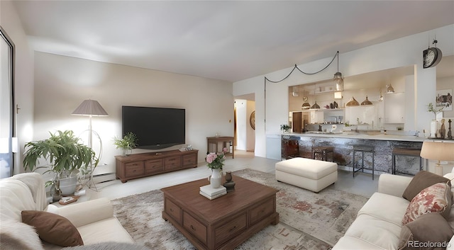 775 S Alton Way Unit 3D, Denver, CO 80247 - living room with a baseboard heating unit
