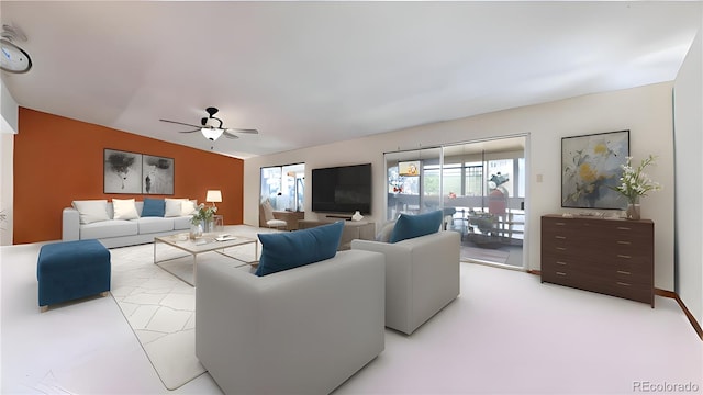 775 S Alton Way Unit 3D, Denver, CO 80247 - living area featuring a ceiling fan and an accent wall