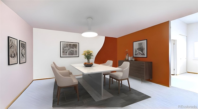 775 S Alton Way Unit 3D, Denver, CO 80247 - dining area featuring baseboards