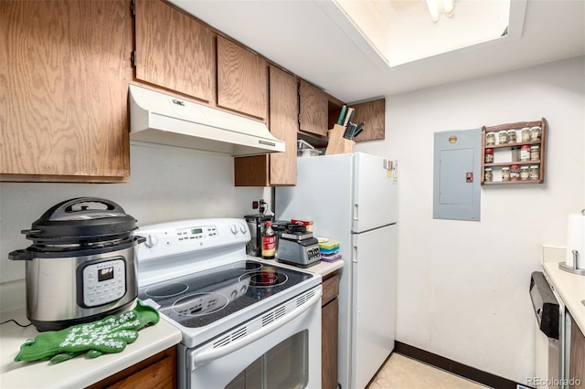 2201 Sable Blvd Unit 1003, Aurora, CO 80011 - kitchen featuring white appliances, under cabinet range hood, electric panel, brown cabinets, and light countertops