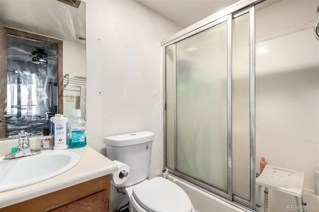 2201 Sable Blvd Unit 1003, Aurora, CO 80011 - full bathroom featuring an enclosed shower, vanity, and toilet
