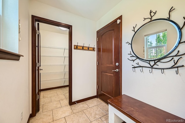 2150 Wagon Way, Louisville, CO 80027 - entryway with light tile patterned floors and baseboards