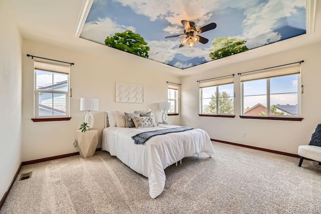 2150 Wagon Way, Louisville, CO 80027 - bedroom with light carpet, baseboards, and a tray ceiling