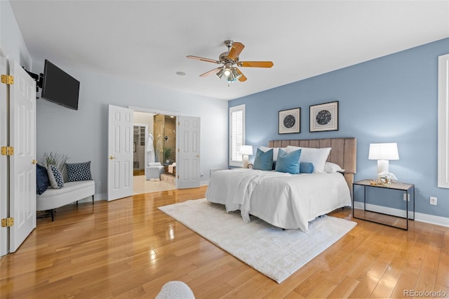 222 S Olive St, Denver, CO 80230 - bedroom featuring light wood-type flooring and ceiling fan