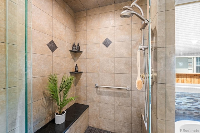 222 S Olive St, Denver, CO 80230 - bathroom featuring tiled shower and a tub