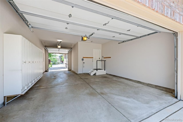 222 S Olive St, Denver, CO 80230 - garage featuring a garage door opener