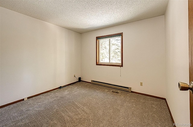 unfurnished room with carpet, a textured ceiling, and baseboard heating